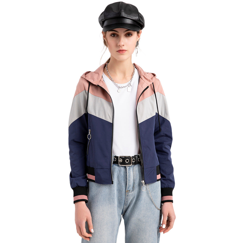 Damen nan leichte Windbreaker-Jacke mit Kapuze, Blockpaneel-Design, Reißverschlusstaschen und elastischem Saum Echo Archiv
