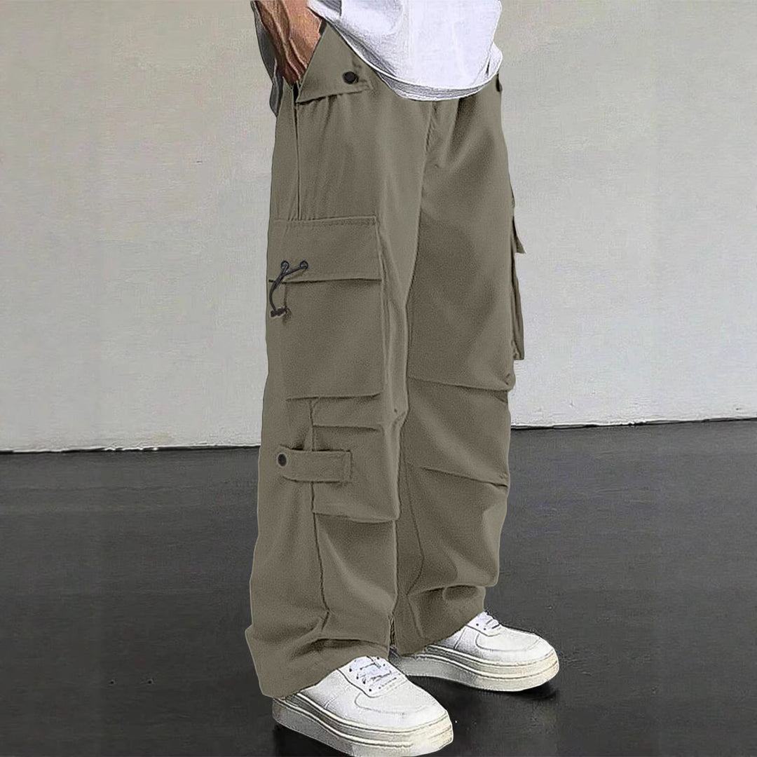 Herren nan baggy Cargohose mit utilitarischen Klapptaschen, Kordelzugbund und verstärkten Nähten Echo Archiv