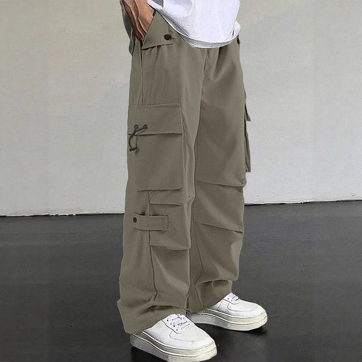 Herren nan baggy Cargohose mit utilitarischen Klapptaschen, Kordelzugbund und verstärkten Nähten Echo Archiv