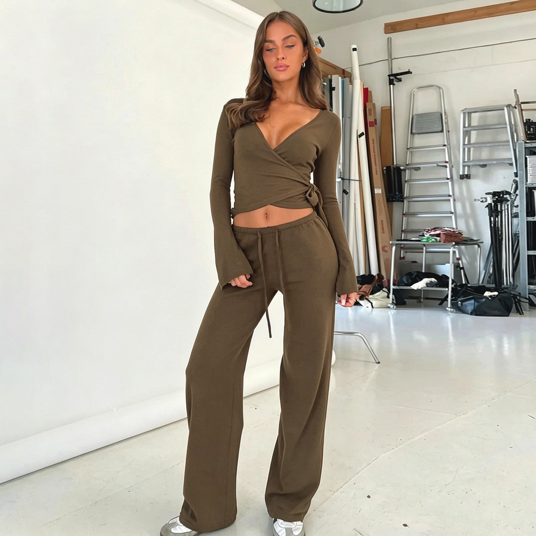 Damen nan Wickel-Cropped-Top mit tiefem V‑Ausschnitt, taillierter Wickelform und langen Glockenärmeln Echo Archiv