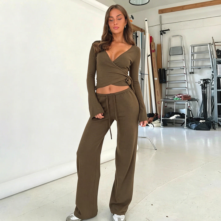 Damen nan Wickel-Cropped-Top mit tiefem V‑Ausschnitt, taillierter Wickelform und langen Glockenärmeln Echo Archiv