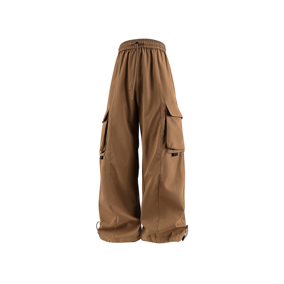 Herren weite Utility‑Cargohose im Baggy‑Cut mit Tunnelzugbund, großen Klappentaschen und verstellbarem Beinabschluss Echo Archiv