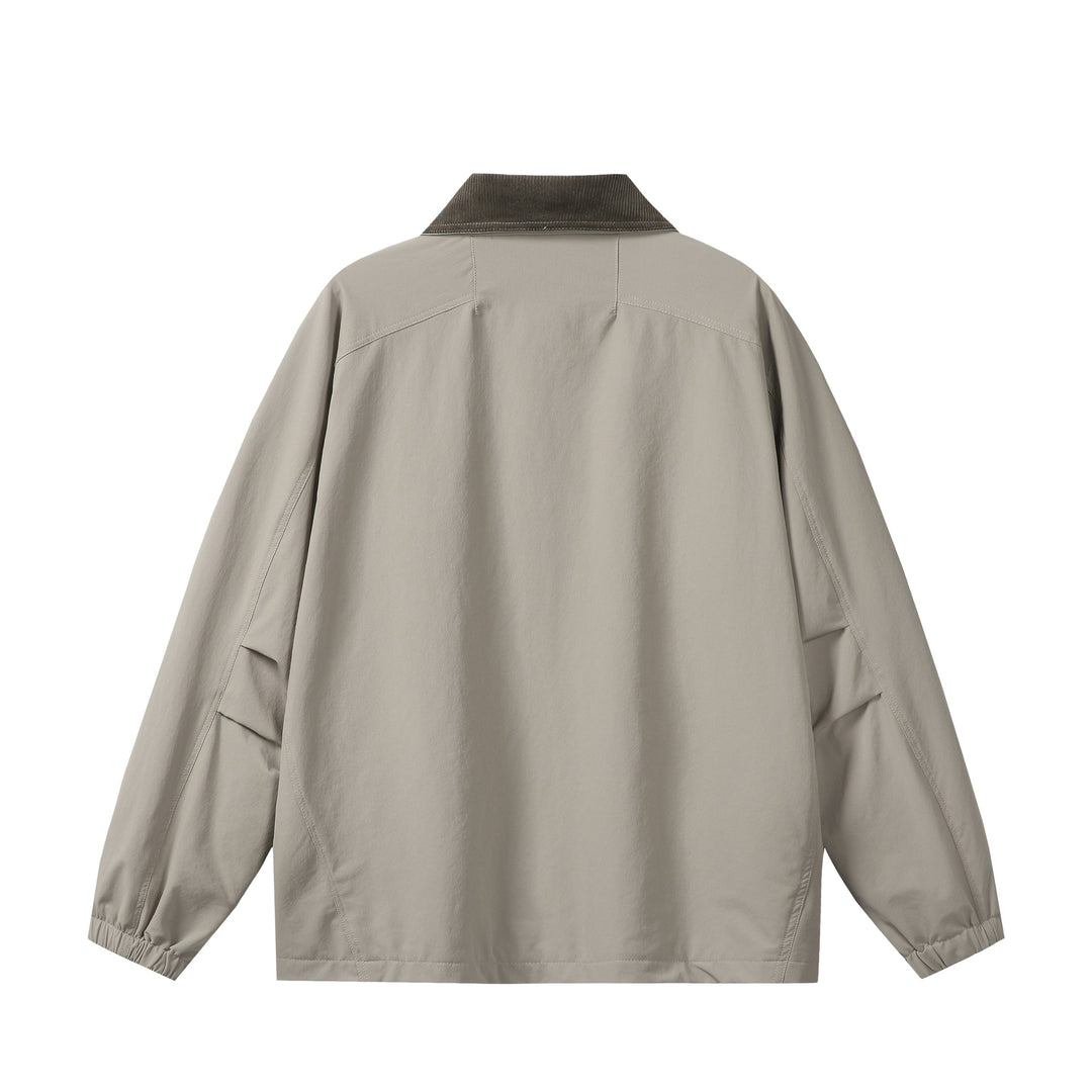 Unisex Kurz geschnittener Boxy-Blouson mit Cordkragen, Reißverschluss und Utility-Pattentaschen Echoarchiv
