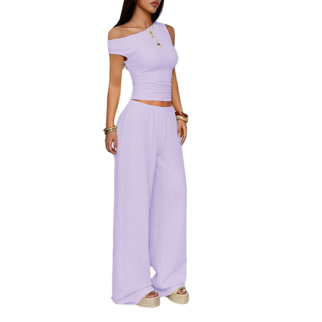 Damen Zweiteiliges Set aus elastischem Rippstoff mit asymmetrischem Top und weitem Hosen Echo Archiv