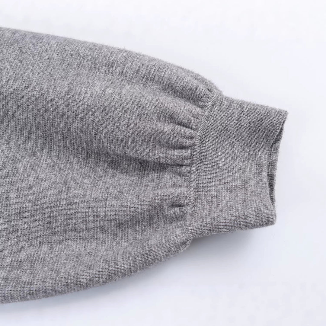 Damen Feinstrickpullover mit Tunnelzugtaillierung, Rundhals und Ballonärmeln Echoarchiv