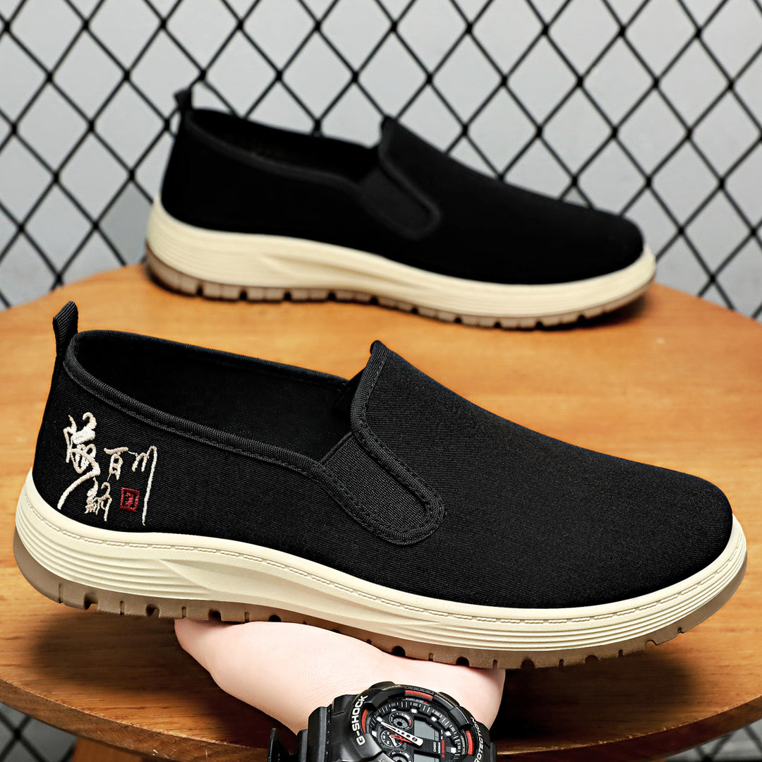 Herren nan nahtloser Canvas-Slip-On mit elastischem Einstieg, besticktem Fersenmotiv und rutschfester EVA-Laufsohle Echo Archiv