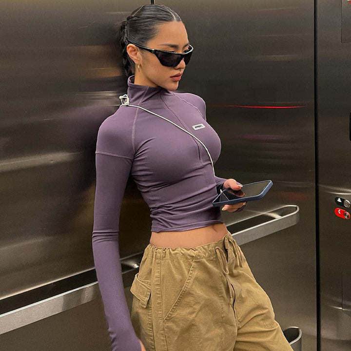 Damen nan figurbetontes Langarm-Zip-Top mit tiefem V-Ausschnitt und elastischem Funktionsstretch Echo Archiv