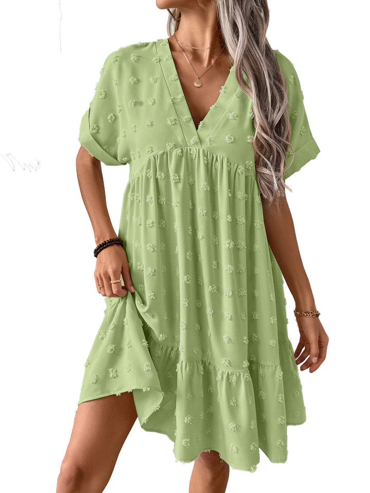 Damen Verspieltes Sommerkleid mit V-Ausschnitt und Rüschensaum Echo Archiv