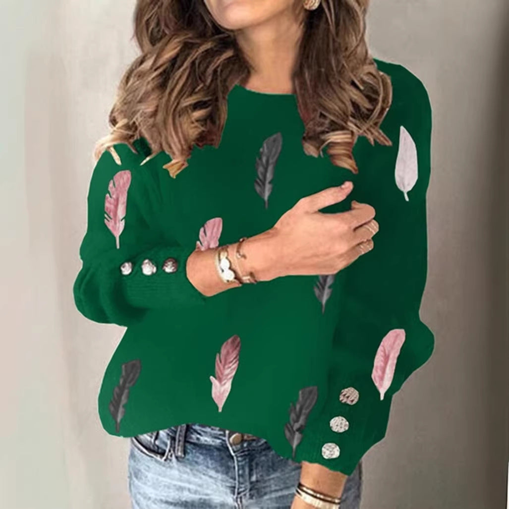 Damen Feinstrickpullover mit Federmotiv, Rundhalsausschnitt und dekorativer Knopfleiste Echoarchiv