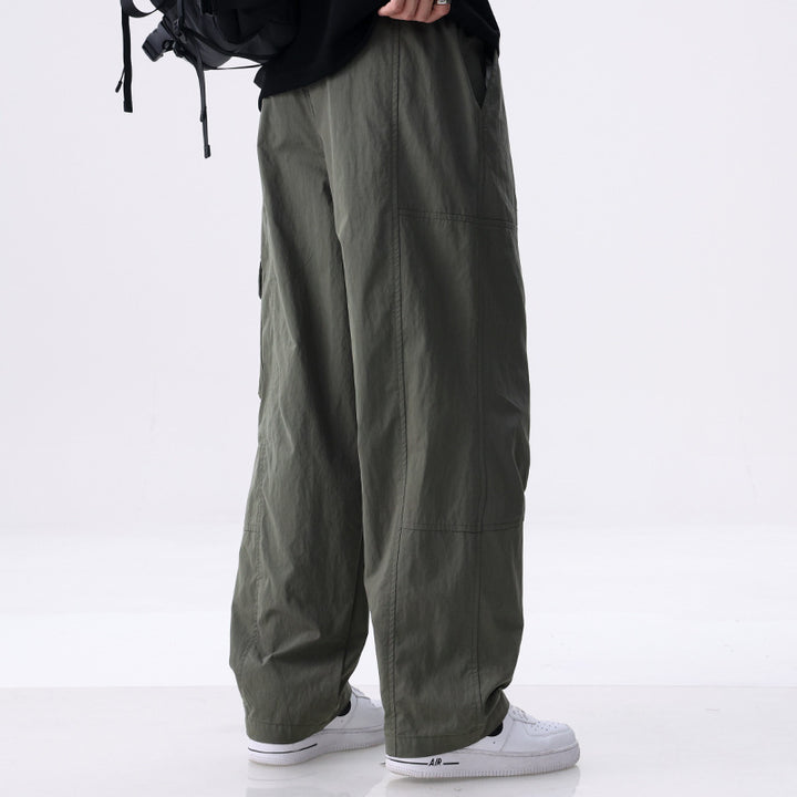 Herren Weite Utility-Cargohose aus Baumwollmix mit Kordelzugbund und aufgesetzten Klappentaschen Echoarchiv