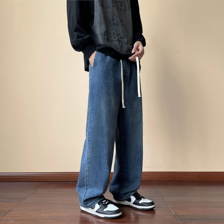 Herren locker sitzende Jeanshose im Oversize-Baggy-Stil mit Tunnelzug Echo Archiv