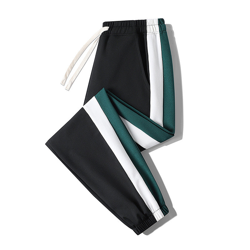 Herren Konische Trackhose mit Kordelzug, seitlichen Colorblock‑Streifen & elastischen Bündchen Echoarchiv