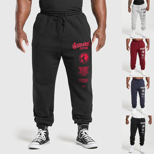 Herren nan konisch geschnittene Baumwollfleece-Sweathose mit elastischem Kordelbund gerippten Beinabschlüssen und großflächigem Logodruck Echo Archiv