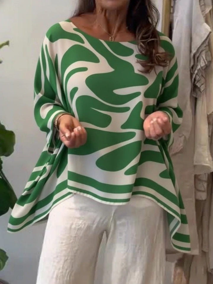 Damen Oversize Sommerbluse mit abstraktem Print, Fledermausärmeln und asymmetrischem Saum – Élovi
