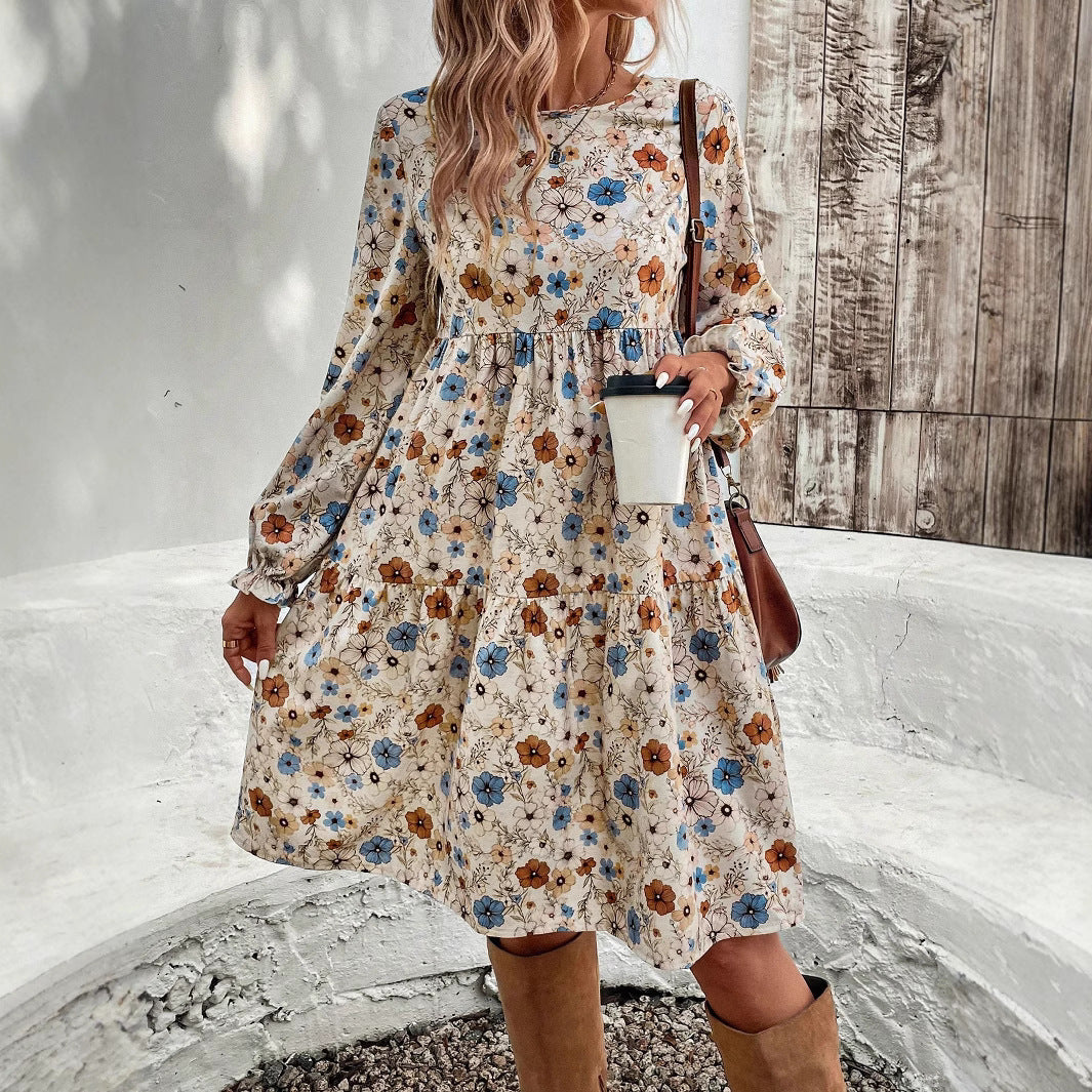Damen Geblümtes Stufenmidikleid mit Rundhalsausschnitt, geraffter Taillenpartie und Ballonärmeln – Avérine