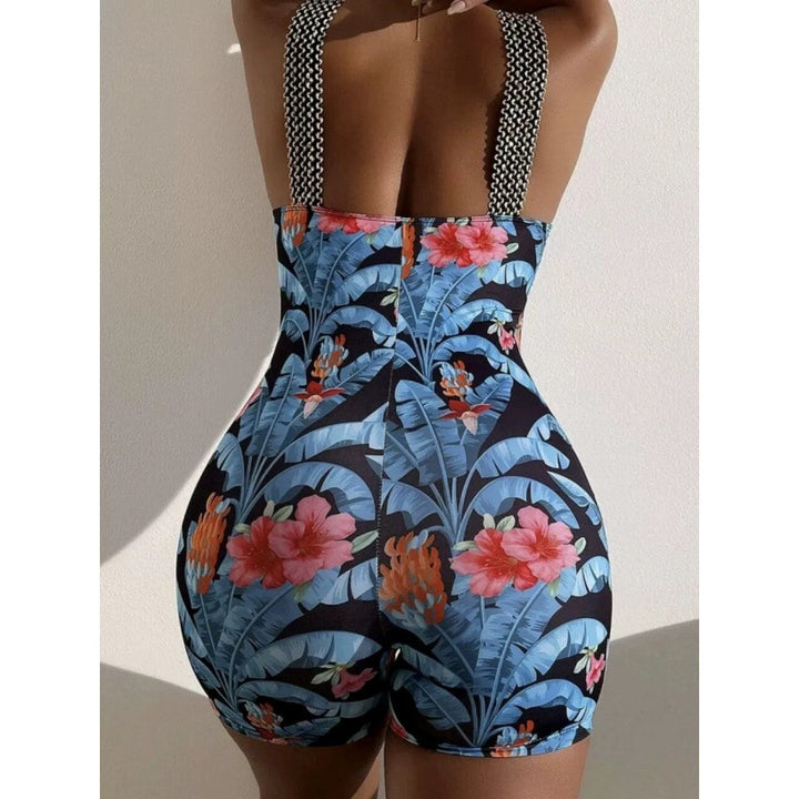 Damen Einteiliger Badeanzug mit tiefem V-Ausschnitt und modischem floralem Design Echo Archiv