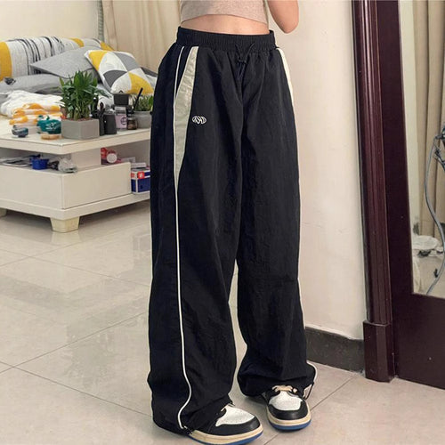 Damen nan weite Trackhose mit Kontrastpaspel, elastischem Bund und Oversize-Schnitt Echo Archiv