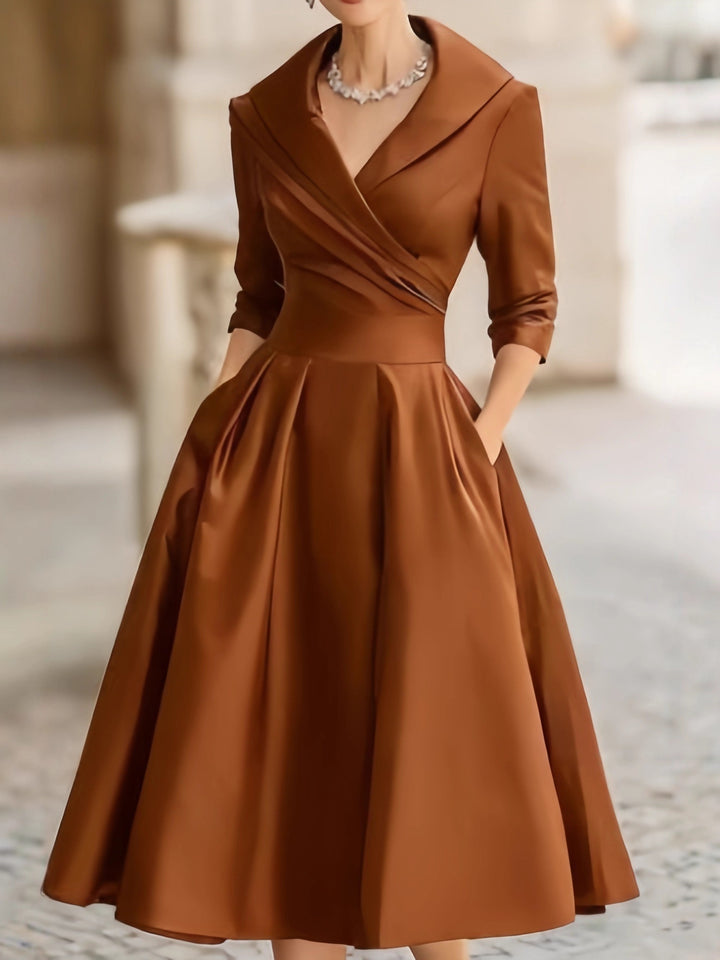 Damen nan elegantes Midikleid mit Wickeloberteil, Dreiviertelärmeln und Eingrifftaschen Echo Archiv
