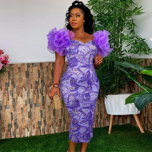 Damen Elegantes Midi-Kleid mit innovativen Puffärmeln und kunstvollem Druck Echo Archiv