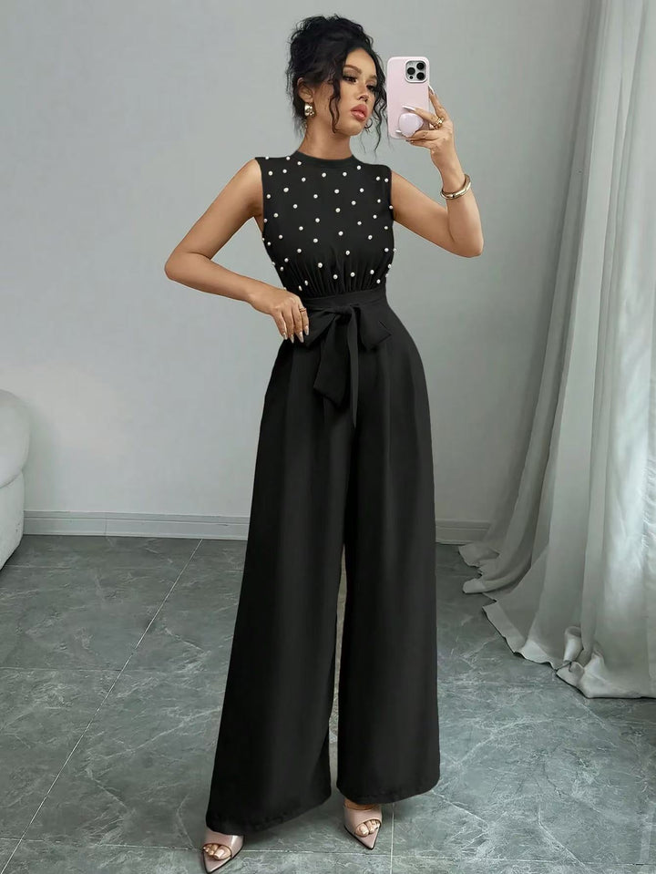 Damen Eleganter Jumpsuit mit Perlenbesatz, Stehkragen und weitem Palazzo-Bein – Solévia