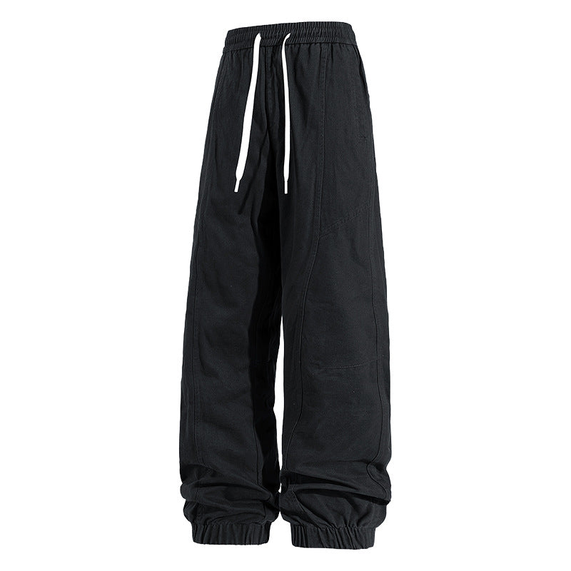 Herren Oversized Utility-Jogginghose aus robustem Baumwollmix mit Kordelbund, seitlichen Cargo‑Taschen & gerippten Bündchen Echoarchiv