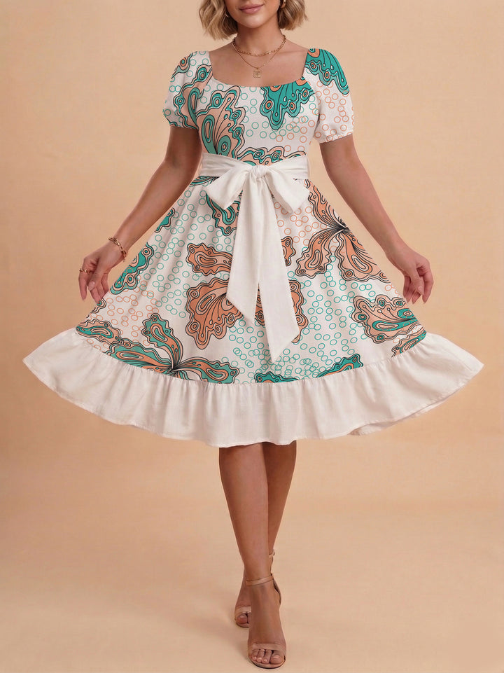 Damen modernes Blumenkleid mit elegantem Taillengürtel und asymmetrischem Saum Echo Archiv