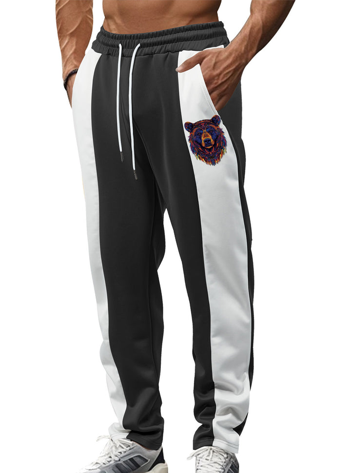 Herren nan sportive Trackpants mit seitlichen Kontrastbahnen elastischem Bund Kordelzug und Hirschstickerei Echo Archiv