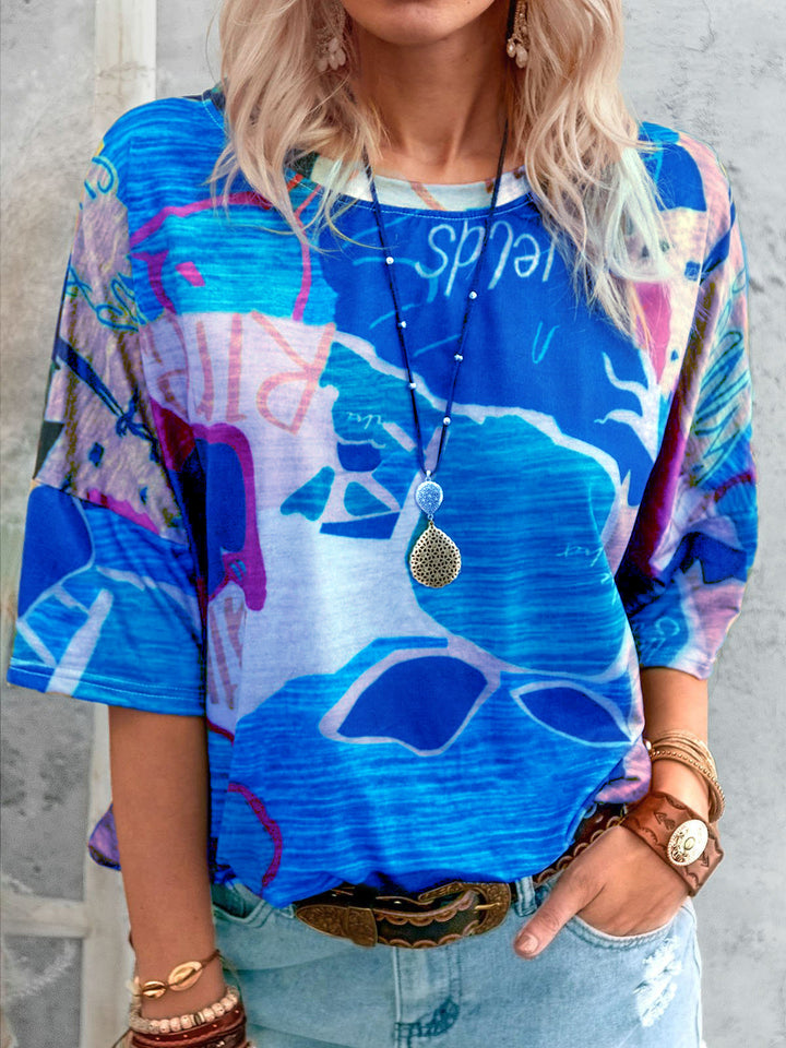 Damen Lockere Viskose Druckbluse mit halblangen Ärmeln und Rundhalsausschnitt – Élovi