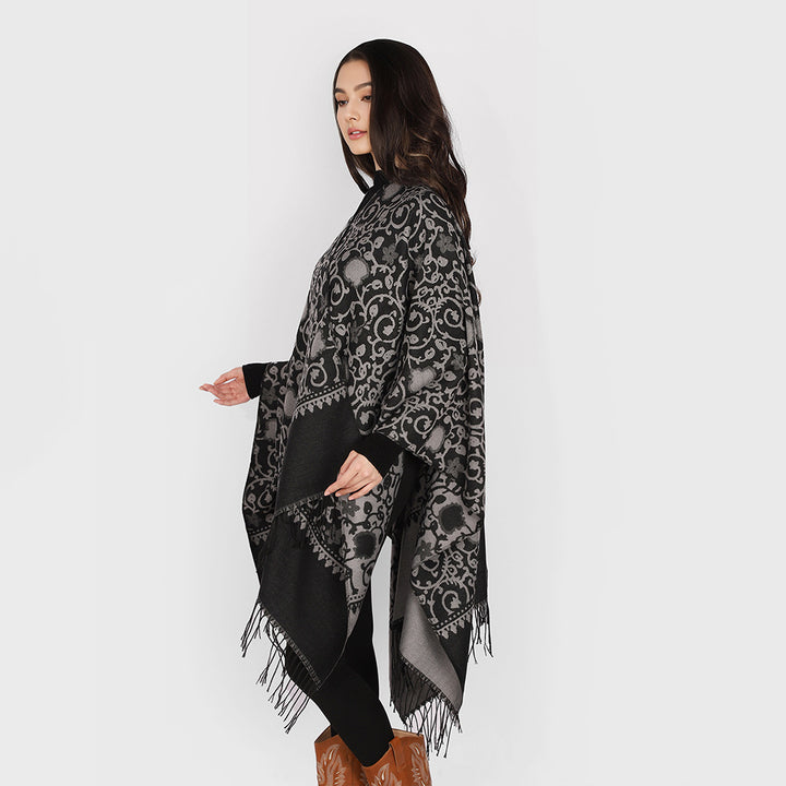 Damen Jacquard-Ruana mit ornamentalem Bordürenmuster und Fransensaum – Avérine