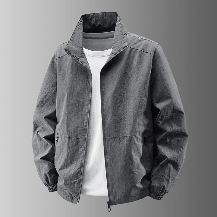 Herren nan atmungsaktive leichte Windjacke mit Stehkragen, elastischen Bündchen und verdeckten Reißverschlusstaschen Echo Archiv
