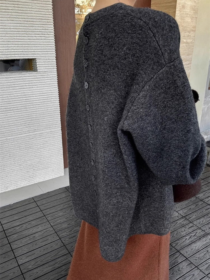Damen Oversize-Feinstrickpullover mit Ballonärmeln und Knopfmanschette Echoarchiv