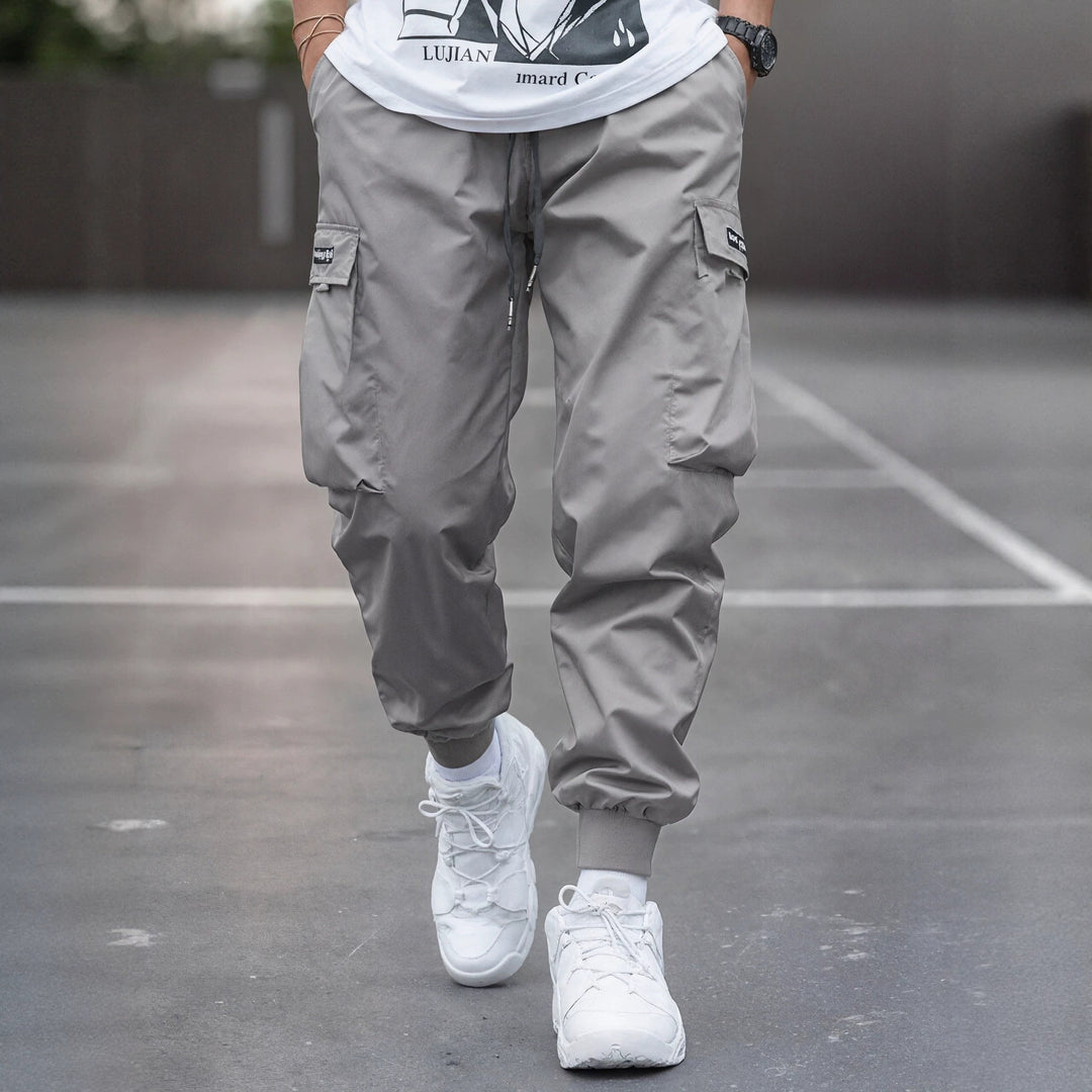 Herren Tapered Cargo-Joggerhose mit elastischem Tunnelzug, verstärkten Klappentaschen & gerippten Knöchelbündchen Echo Archiv