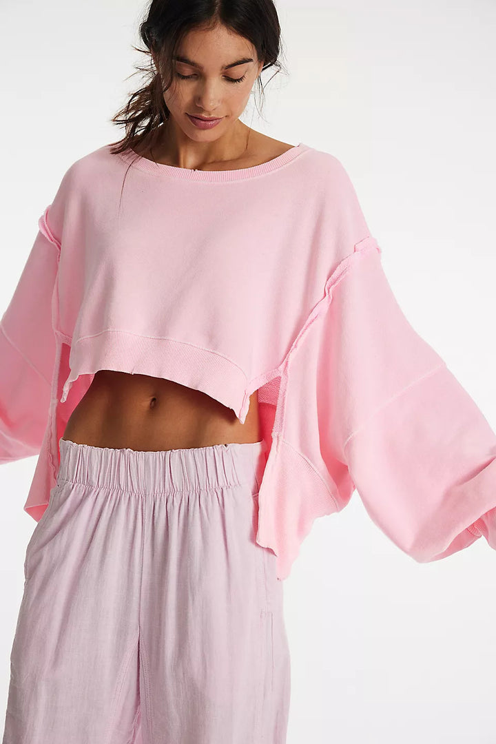 Damen cropped Oversize-Sweatshirt mit Daumenloch, fransigem Saum und weitem Raglanärmel – Avérine