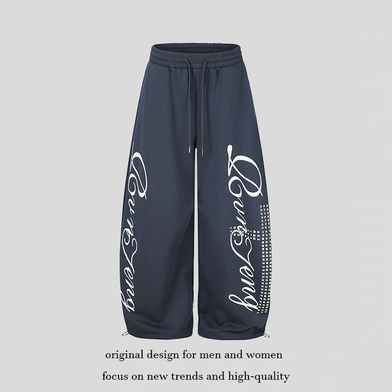 Damen Palazzo-Sweatpants im Culotte-Stil mit hohem Bund, Tunnelzug, Schriftprint und Strassbesatz Echoarchiv