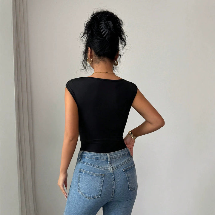 Damen nan körperformender hochgeschnittener Body mit asymmetrischem Träger und Ziermetallring Echo Archiv