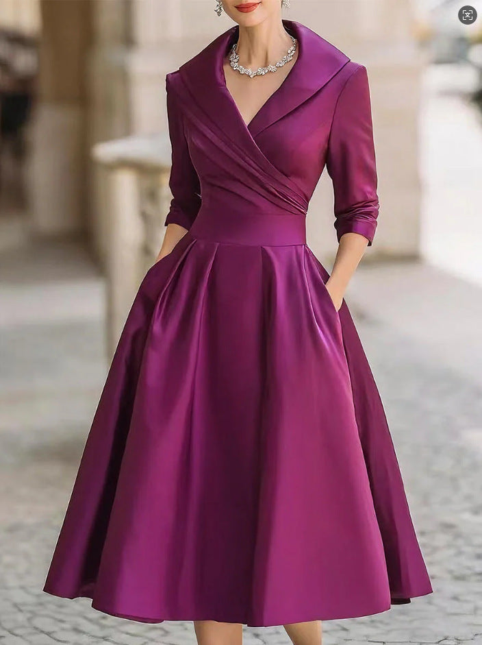 Damen nan elegantes Midikleid mit Wickeloberteil, Dreiviertelärmeln und Eingrifftaschen Echo Archiv