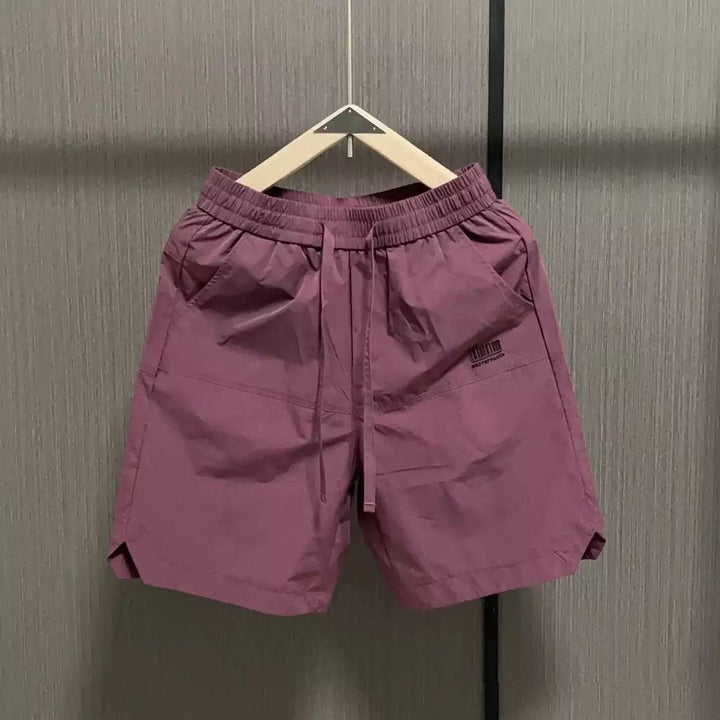 Herren lässige Sportshorts mit elastischem Bund und seitlichen Eingrifftaschen Echoarchiv