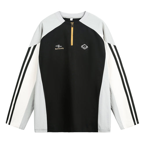 Unisex Sportliches Oversize-Halbzip-Sweatshirt im Retro-Track-Stil mit Kontrastpaneelen und Drei-Streifen-Ärmeln Echo Archiv