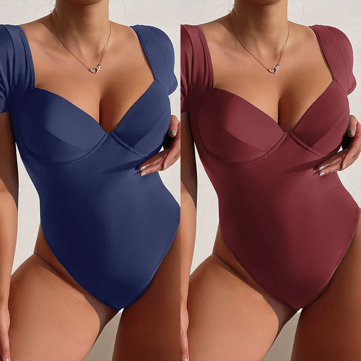 Damen Einteiler Badeanzug mit eleganten Kurzärmel und tiefem V-Ausschnitt Echo Archiv