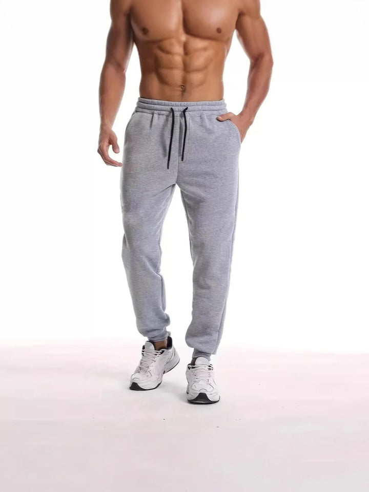Unisex nan athleisure Jogginghose mit innen angerautem Fleece, elastischem Kordelbund und gerippten Knöchelabschlüssen Echo Archiv