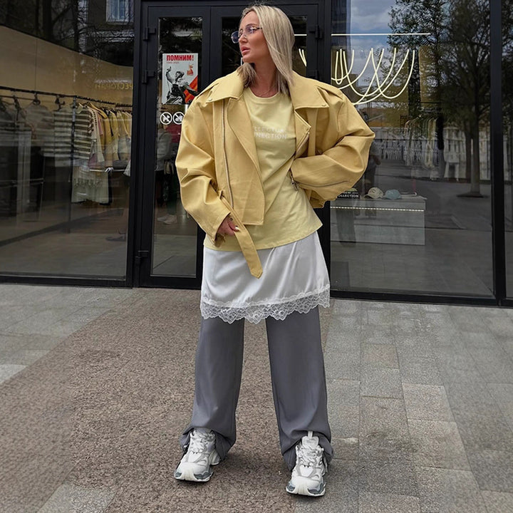 Damen Oversize-Bikerjacke aus veganem Lederimitat mit großem Revers und Taillengürtel Echoarchiv