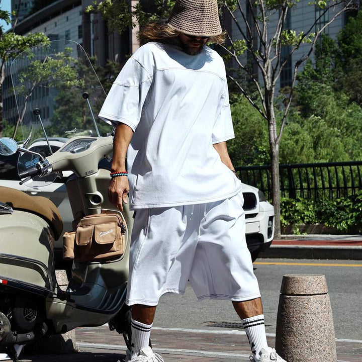 Herren lässiges Kurzarm-T-Shirt mit oversized Schnitt und komfortablen Hosen Echoarchiv