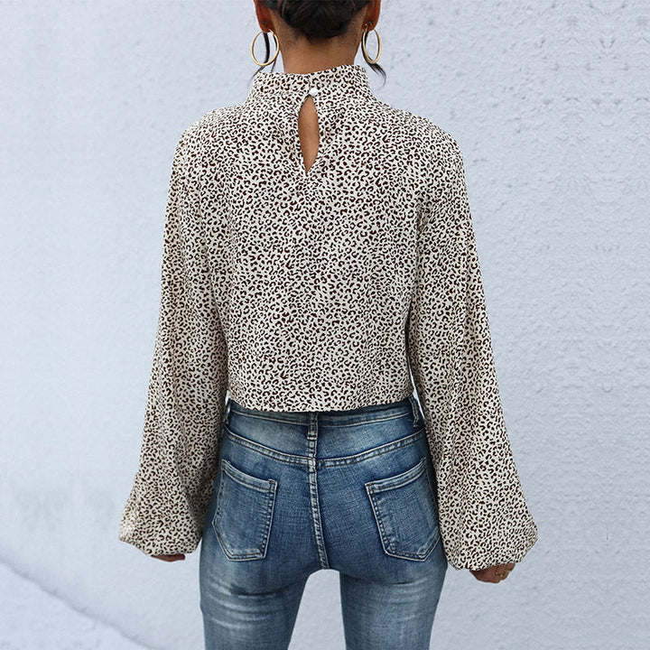 Damen Kurzgeschnittene Twist‑Bluse mit Stehkragen, Knotenfront und Allover Animalprint Echoarchiv