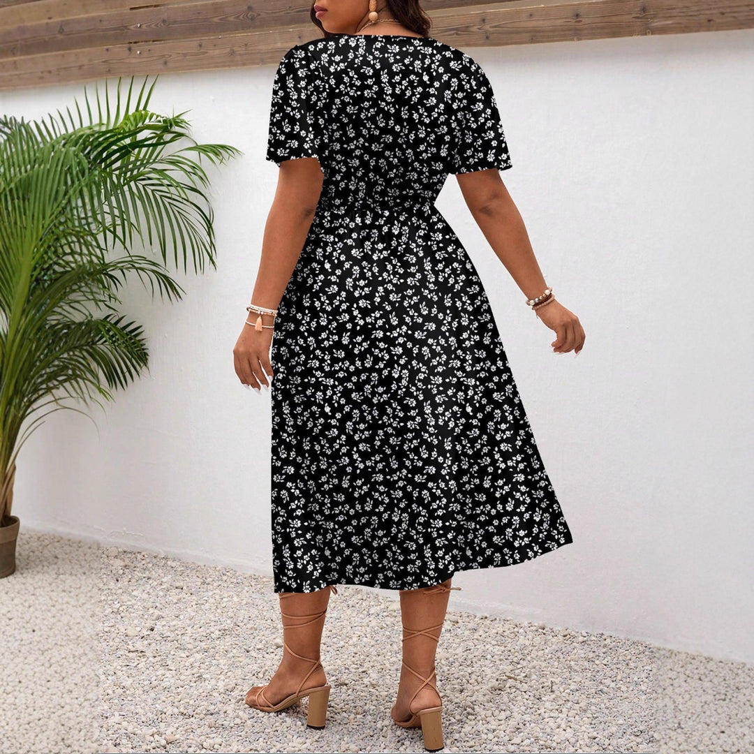 Damen Midi-Kleid mit Blumenmuster und vorteilhaftem Schlitz Echo Archiv