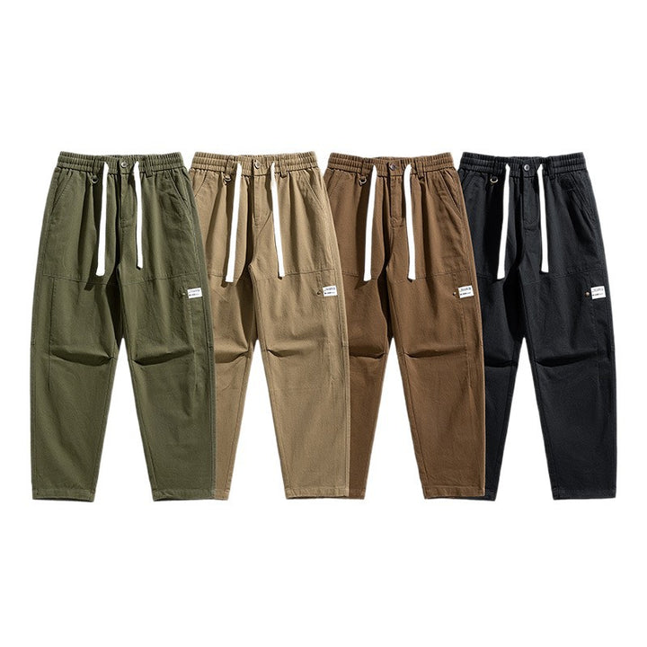 Herren Locker geschnittene Cargo-Jogginghose mit Tunnelzug, Knieabnähern und Utility‑Details Echo Archiv