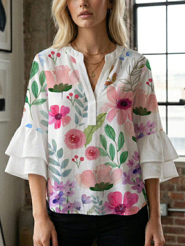 Damen elegantes Oberteil mit voluminösen Rüschensäumen und floralem Design Echo Archiv