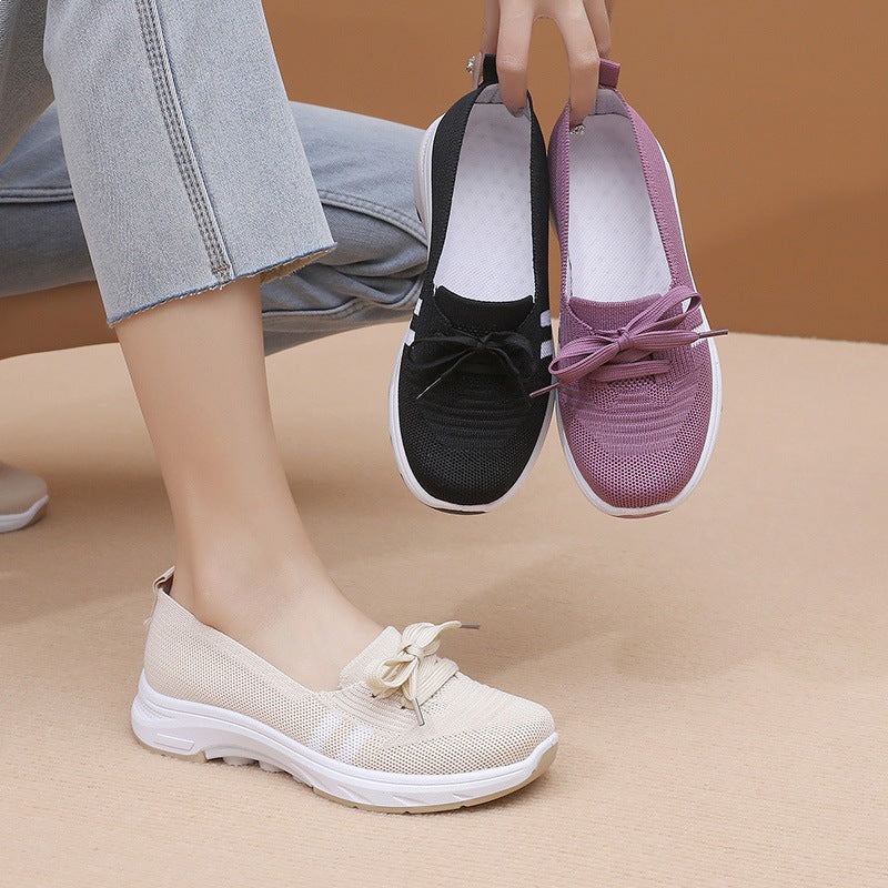 Damen Schlupf-Strick-Sneaker mit dekorativer Schleife und gedämpfter Plateausohle – Névara