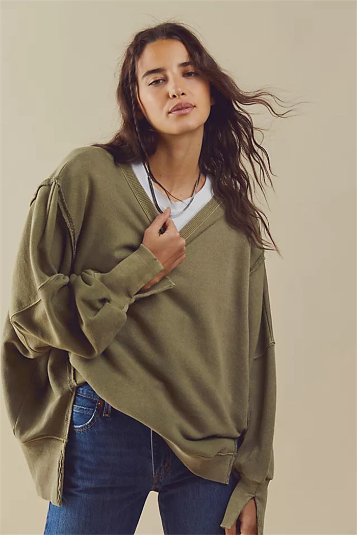 Damen oversized Sweatshirt mit Ballonärmeln, offenen Saumnähten und seitlichen Schlitzen – Avérine