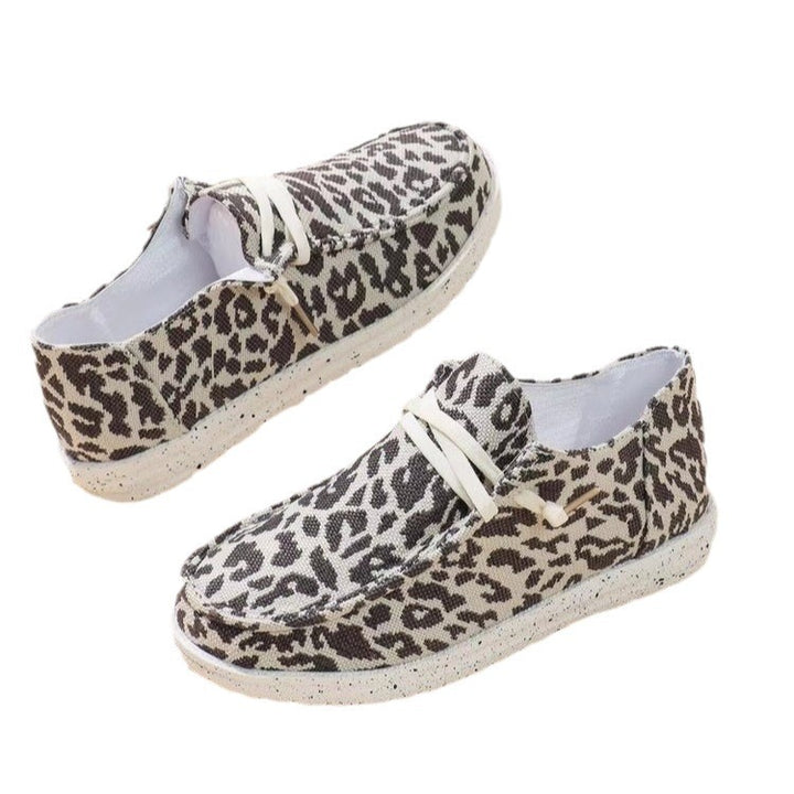 Damen Slip-On Sneaker im Leoprint mit Canvas-Obermaterial und elastischem Schnürband Echoarchiv