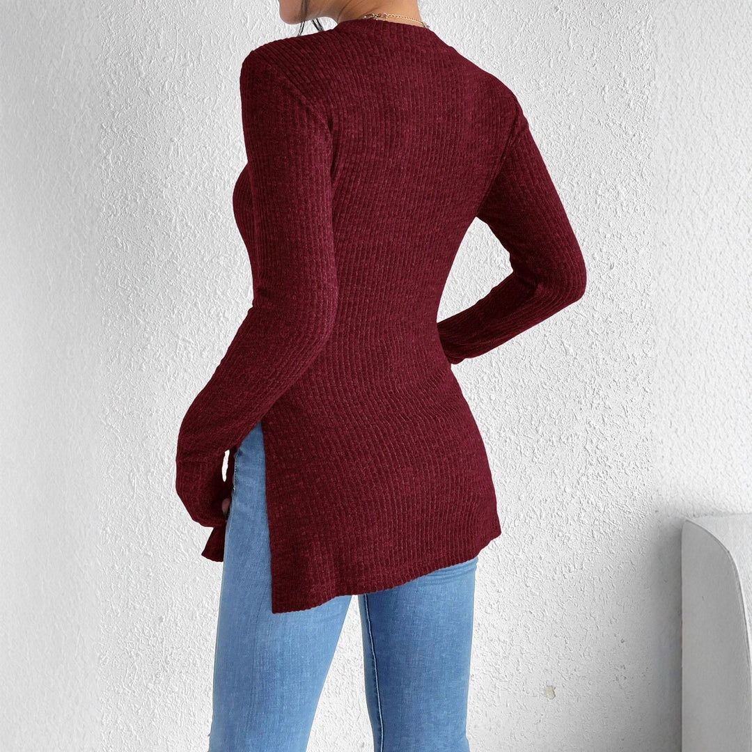 Damen Gerippter Taillierter Feinstrick-Pullover mit Stehkragen, langen Ärmeln und Seitenschlitzen Echoarchiv